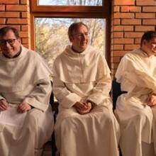 The friars pause for a second